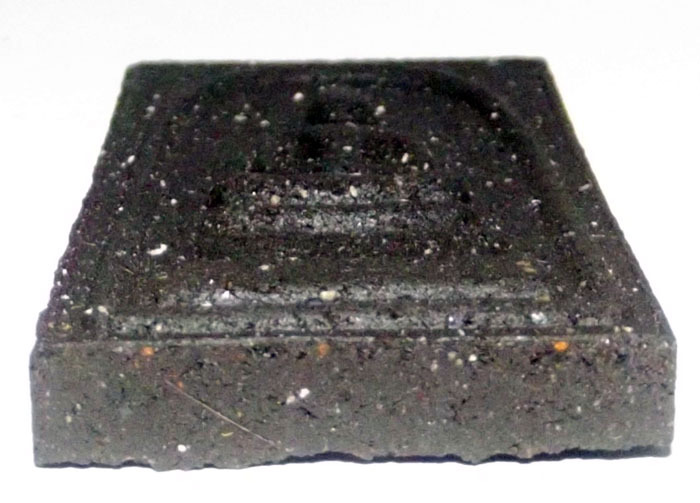 Close up from base of the Pra Somdej's sacred muan sarn ingredients
