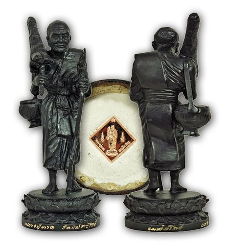 7.5 Inches high bucha image of the great 'Somdej Jao Pako Samee Ram' Pra Luang Por Tuad, in tudong posture with 'glod' umbrella.