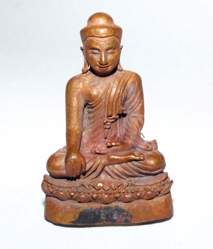 Pra Kring Tan Jai represents the Wishfulling Buddha seated in the 'subduing Mara' posture; this authentic Buddhist loi ongk statuette is made by the revered Lanna master Kroo Ba Buddha.