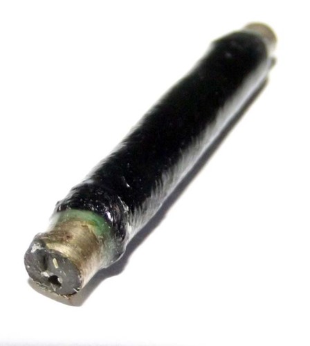 The takrut is covered in a coating of black lacquer for increased durability. The spell within the magic scroll also contains sacred herbal resin mixture